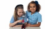 Girls Studying With Microscope Stock Photo