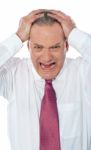 Frustrated Senior Businessman Stock Photo