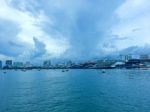 Landscape Of Sea With Boat And Downtown And Building And Blue Sky Stock Photo