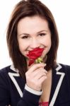 Lovely Young Girl With A Beautiful Red Rose Stock Photo