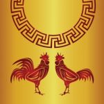 Red  Roosters And Chinese Circle On Yellow Background Stock Photo