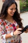 Pretty Student Girl Surfing The Internet Stock Photo