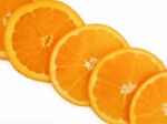 Fresh Orange Slice On White Background Stock Photo