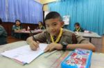 Activity Of Teaching Elementary Students. Elementary Students Are Test Lesson. The Students Intend Exam Stock Photo