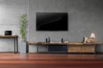 Led Tv On Concrete Wall With Wooden Furniture In Living Room Stock Photo