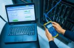 Man Fix Server Network In Data Center Room Stock Photo