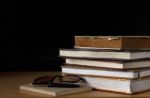 Old Book On Wooden Table Stock Photo