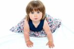 Adorable Baby Girl Crawling Stock Photo