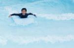 Boy Play In Clear Water Stock Photo