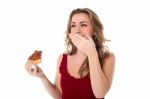 Pretty Girl Enjoying Yummy Pizza Slice Stock Photo