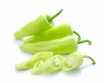 Green Hot Chili Pepper On White Stock Photo