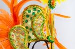 Helmet Decorated With Bright Stones And Feathers For Carnival Stock Photo