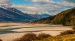 Wilderness With Mountains Trees And River Stock Photo