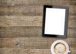 Tablet White Screen Display And Coffee On Old Wood Background Stock Photo