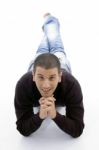 Young Man Lying On The Floor Stock Photo