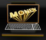 Money On Laptop Showing Earnings Stock Photo