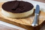 Fresh Classic Homemade Cheesecake With Dark Chocolate Topping Stock Photo