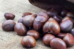 Chestnuts On Sack Stock Photo