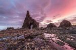 Storm Sunrise On The Beach Of Campiecho Stock Photo