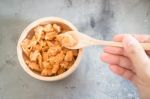 Hand On Fried Crispy Shrimp Head Stock Photo