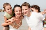 Family In The Beach Stock Photo