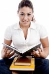 Girl Student holding notebook Stock Photo