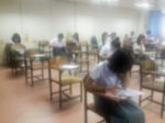 Blur Background University Students Writing Answer Doing Exam In Stock Photo