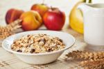 Bowl Of Muesli For Breakfast With Fruits Stock Photo