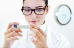 Doctor Nurse Examining Thermometer Stock Photo