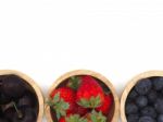 Fresh Summer Fruits, Cherry, Strawberry, And Blueberry In Wooden Stock Photo