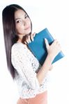 Young Lady Holding Notebook Stock Photo