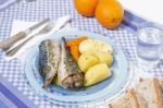 Mackerel Fish With Potato And Carrot Stock Photo