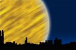 Big Yellow Moon On City Sky Stock Photo