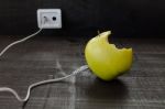 Green Apple Connected To An Ethernet Cable Stock Photo