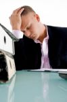 stressed Businessman at his desk Stock Photo