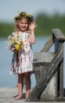 Little Girl With Flowers Stock Photo