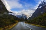 Perspective Photography Of Road To Milford Sound National Park Most Popular Natural Traveling Destination In Southland New Zealand Stock Photo