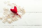 Scattered Wooden Letters And A Red Heart Stock Photo