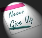 Never Give Up Notebook Displays Determination And Motivation Stock Photo