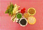 Variety Of Kitchen Ingredients With Fresh And Dried Legumes Stock Photo