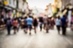 Blurred People Walking On The Street Stock Photo