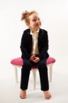 Little Girl In Black Suit Stock Photo