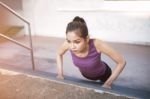 Sport Urban Young Athletic Woman Doing Push-ups. Muscular And St Stock Photo