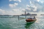 Motorboat Coming Into The Grand Canal In Venice Stock Photo