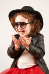 Little Girl Fashion Model With Black Hat Stock Photo