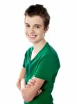 Smiling Boy With crossed Arms Stock Photo