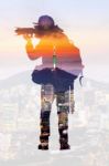 Double Exposure Portrait Of Photographer And City Skyline Stock Photo