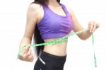 Woman In Sport Bra Measuring Her Body With Tape Isolated On Whit Stock Photo