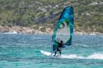 Windsurfing At Porto Pollo In Sardinia Stock Photo