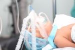 Unidentified Boy With Oxygen Mask In The Surgery. Focus In The M Stock Photo